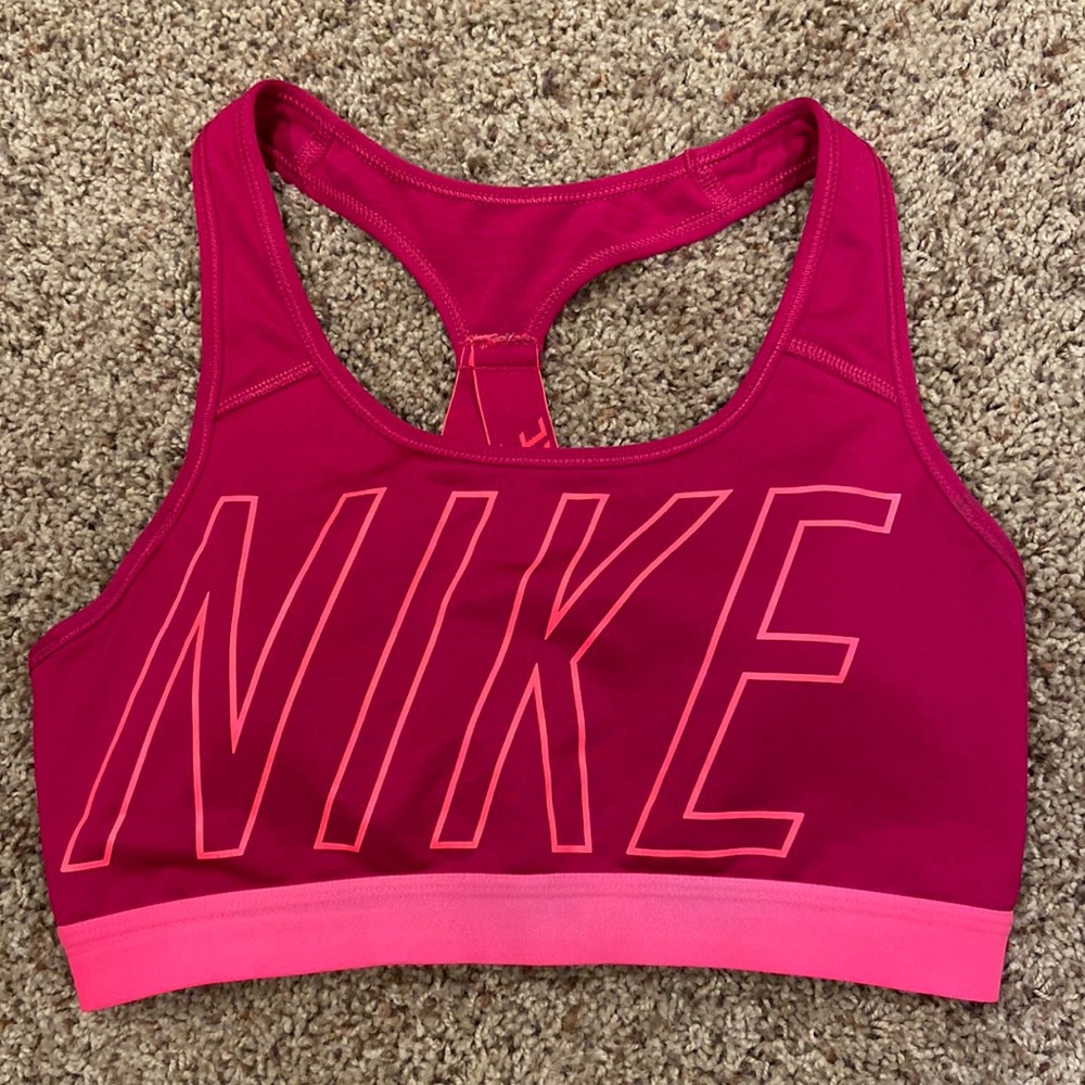 nike medium impact pink sports bra